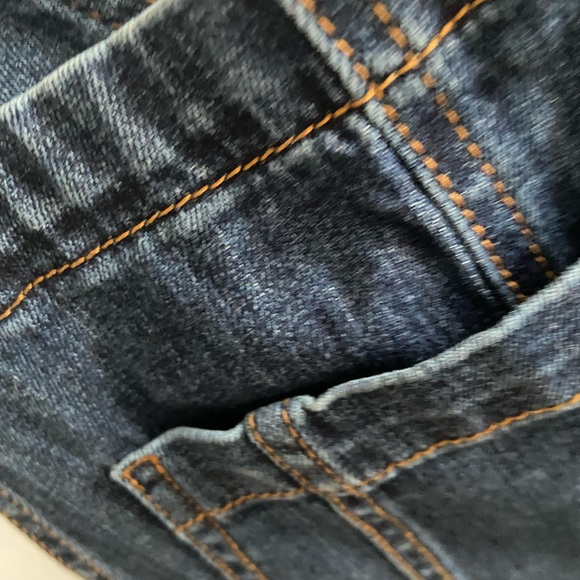 Overalls in a dark jean - Picture 2 of 3